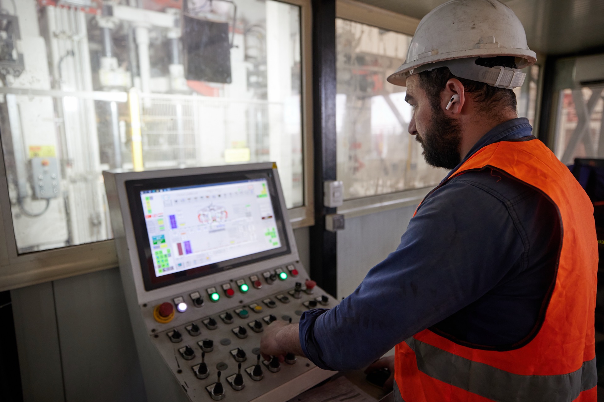 Egycrete operator monitoring the production line control panel